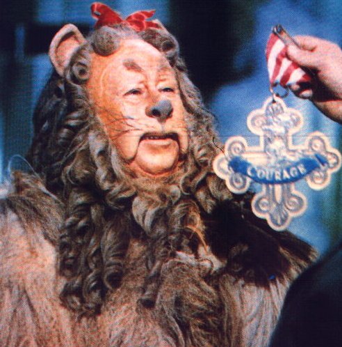 Cowardly Lion receiving Courage award